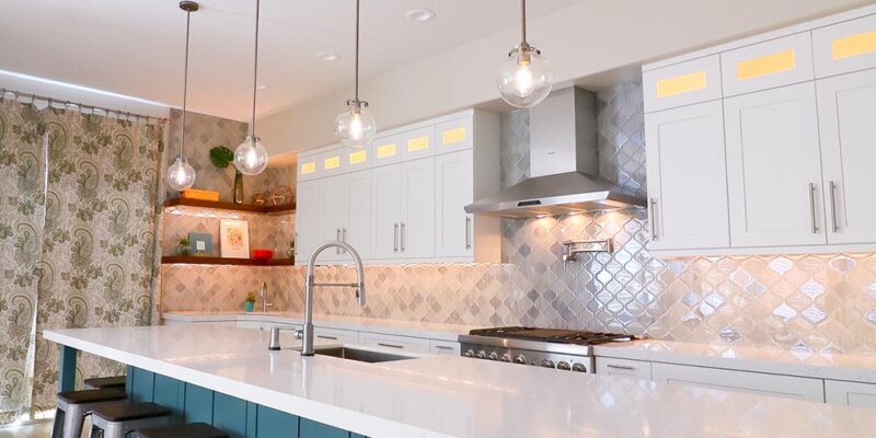 Beautiful kitchen with recessed lighting and 4 hanging light fixtures